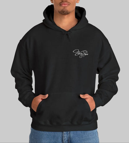 Man wearing a black heavy weight hoodie with white Stay True lettering design by WCS.