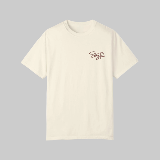 Beige t-shirt with 'Stay True' text on a gray background