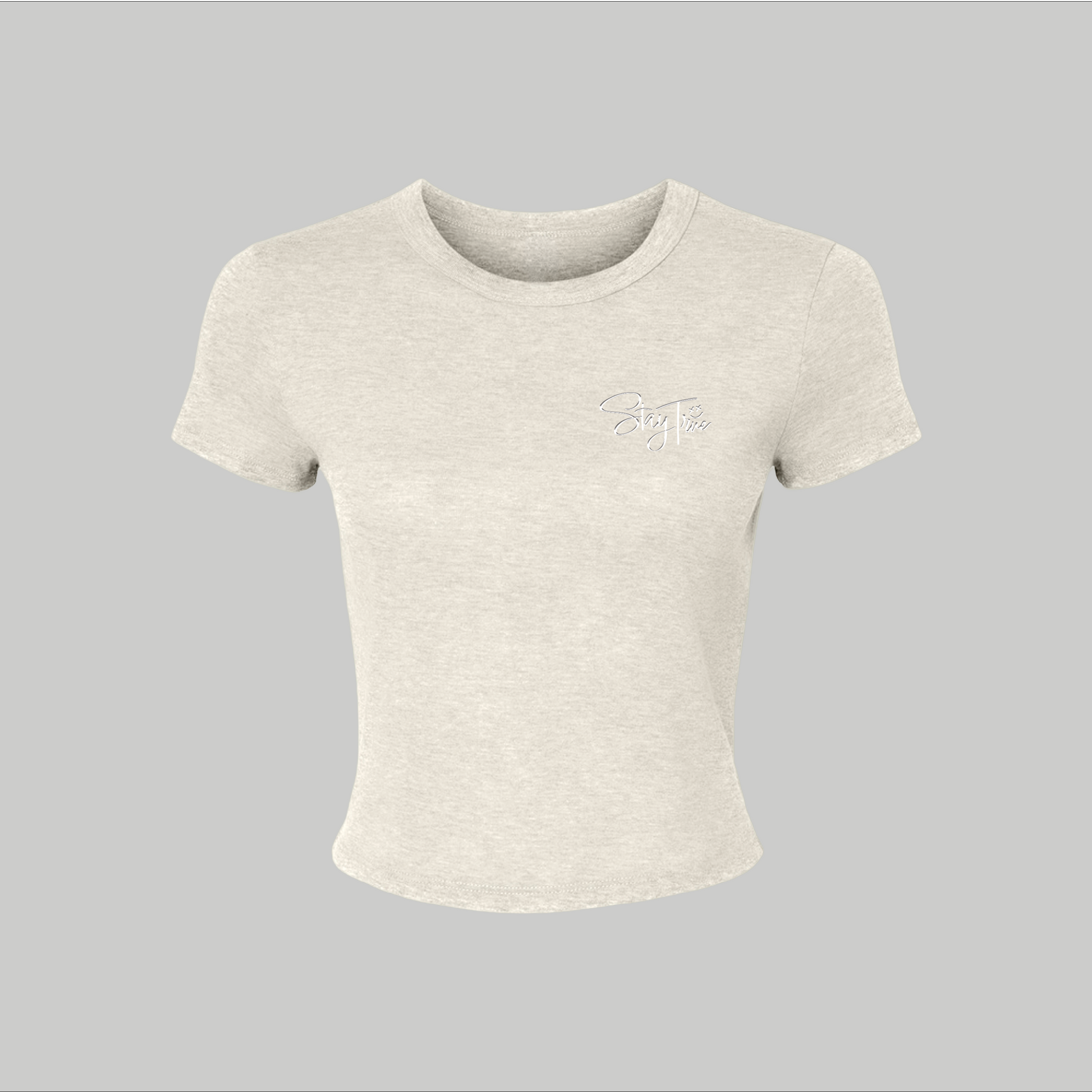 Beige crop top with a logo on a gray background