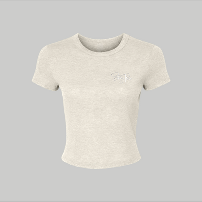 Beige crop top with a logo on a gray background