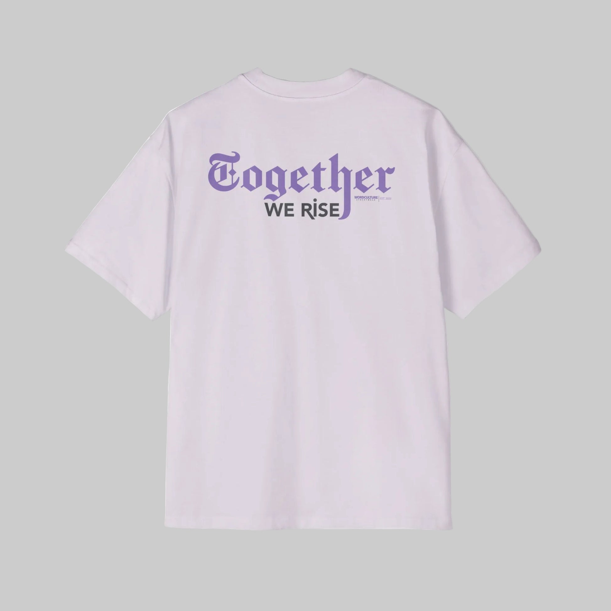 Light purple oversized t-shirt with 'Together We Rise' text on the back against a gray background. 