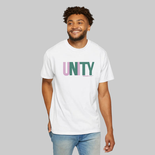 Man wearing a white t-shirt with 'UNITY' printed on it against a white background designed by WordCulture Streetwear.